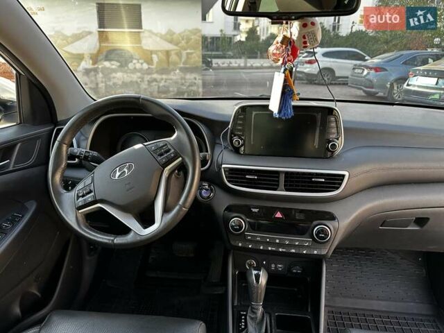 Белый Хендай Туксон, объемом двигателя 2 л и пробегом 50 тыс. км за 22500 $, фото 11 на Automoto.ua