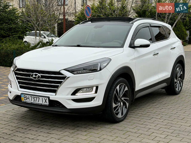 Белый Хендай Туксон, объемом двигателя 2 л и пробегом 50 тыс. км за 23800 $, фото 4 на Automoto.ua