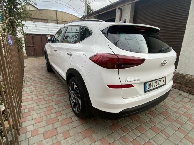 Білий Хендай Туксон, об'ємом двигуна 2 л та пробігом 50 тис. км за 21999 $, фото 5 на Automoto.ua