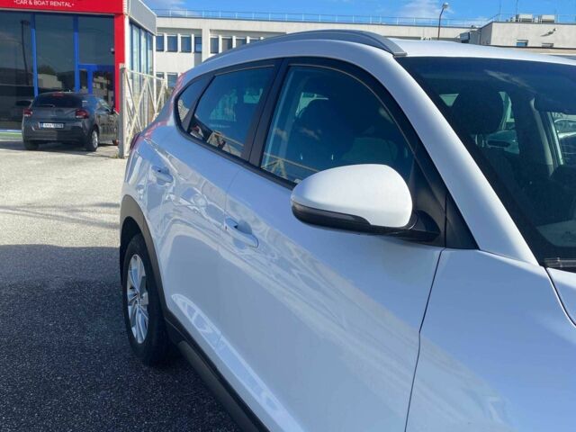 Белый Хендай Туксон, объемом двигателя 1.6 л и пробегом 77 тыс. км за 15700 $, фото 6 на Automoto.ua