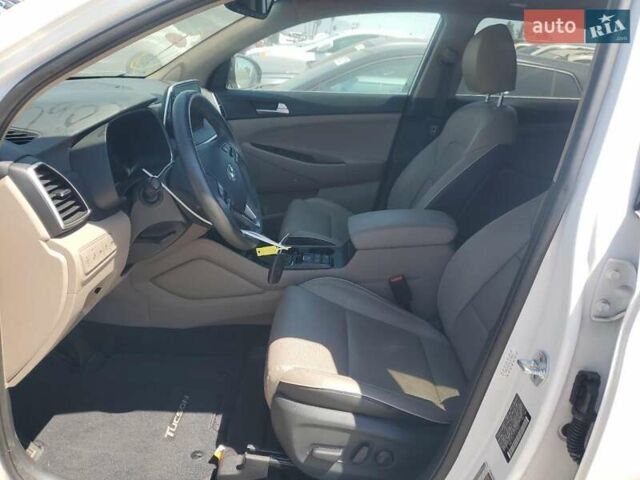 Белый Хендай Туксон, объемом двигателя 2.4 л и пробегом 55 тыс. км за 4100 $, фото 6 на Automoto.ua