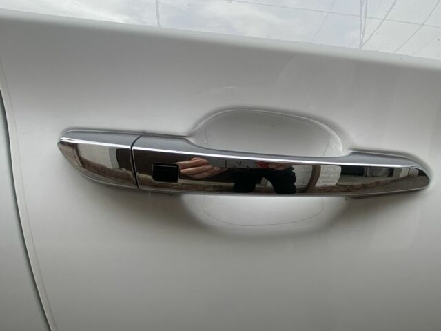 Білий Хендай Туксон, об'ємом двигуна 2 л та пробігом 50 тис. км за 21999 $, фото 6 на Automoto.ua