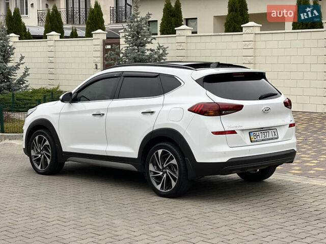 Белый Хендай Туксон, объемом двигателя 2 л и пробегом 50 тыс. км за 23800 $, фото 10 на Automoto.ua