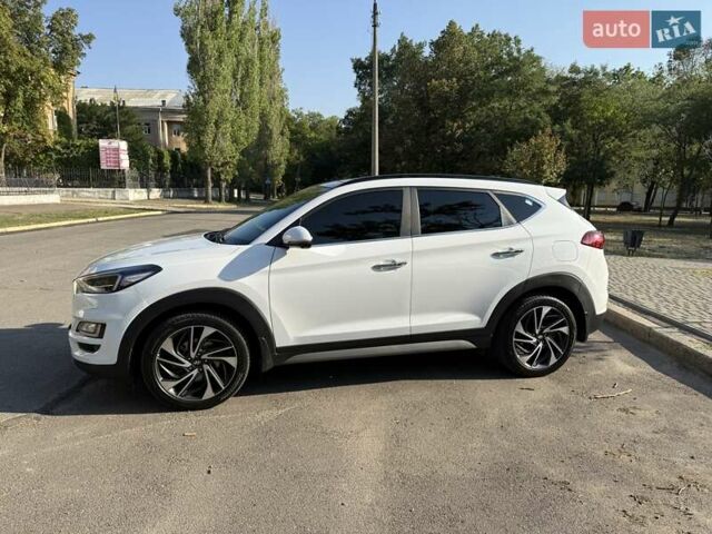Білий Хендай Туксон, об'ємом двигуна 2 л та пробігом 86 тис. км за 28000 $, фото 9 на Automoto.ua