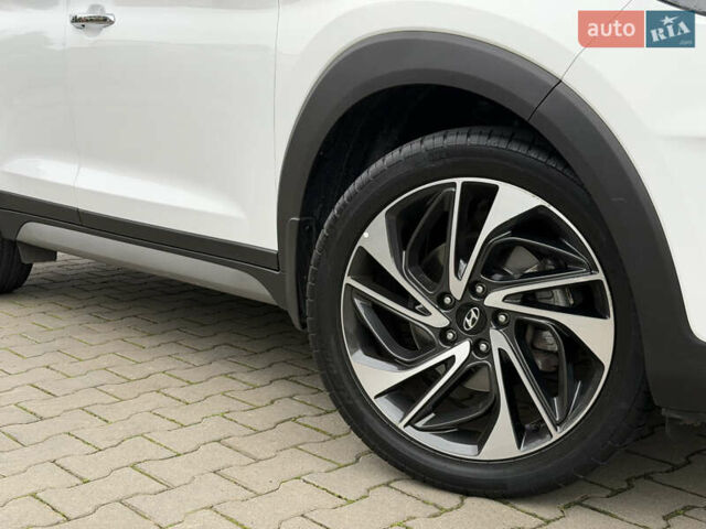 Белый Хендай Туксон, объемом двигателя 2 л и пробегом 50 тыс. км за 23800 $, фото 50 на Automoto.ua