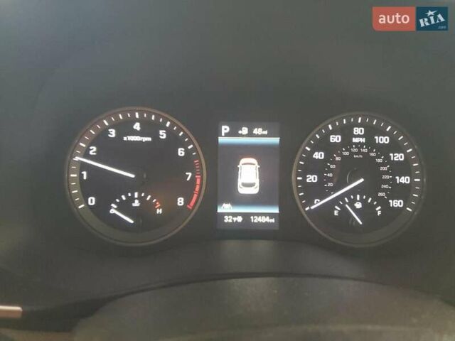 Белый Хендай Туксон, объемом двигателя 2.4 л и пробегом 20 тыс. км за 4100 $, фото 8 на Automoto.ua