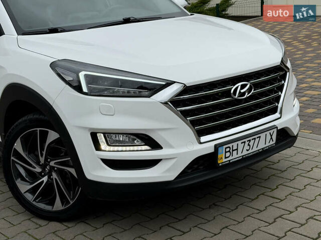 Белый Хендай Туксон, объемом двигателя 2 л и пробегом 50 тыс. км за 23800 $, фото 28 на Automoto.ua