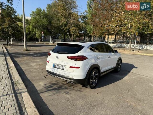 Білий Хендай Туксон, об'ємом двигуна 2 л та пробігом 86 тис. км за 28000 $, фото 5 на Automoto.ua