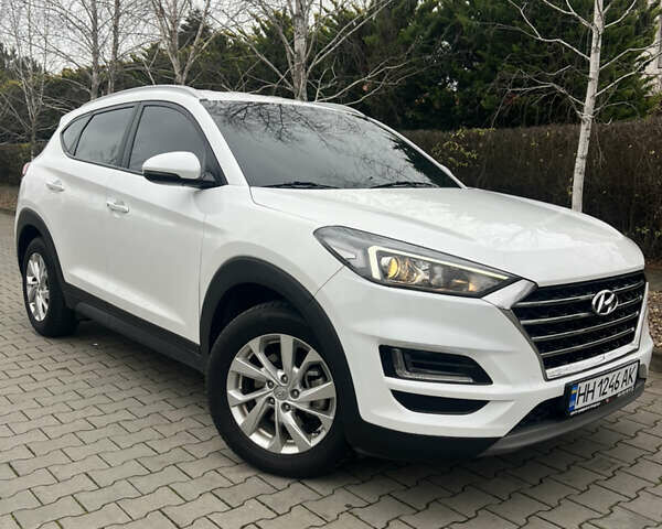 Білий Хендай Туксон, об'ємом двигуна 2 л та пробігом 136 тис. км за 22900 $, фото 2 на Automoto.ua