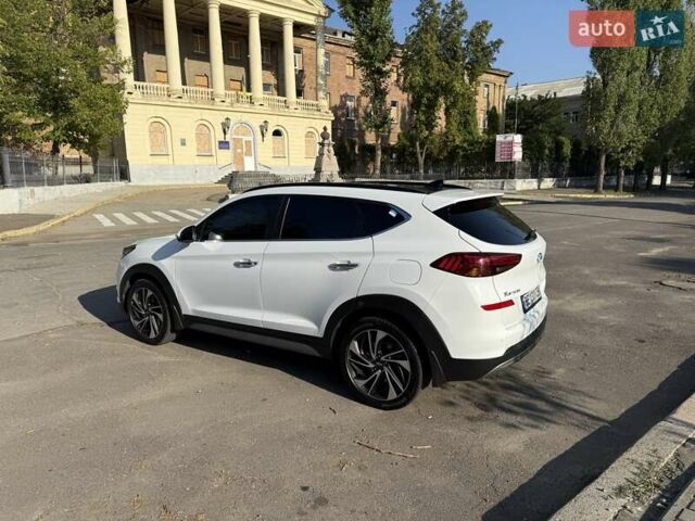 Білий Хендай Туксон, об'ємом двигуна 2 л та пробігом 86 тис. км за 28000 $, фото 8 на Automoto.ua