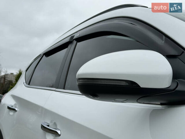 Белый Хендай Туксон, объемом двигателя 2 л и пробегом 50 тыс. км за 23800 $, фото 44 на Automoto.ua