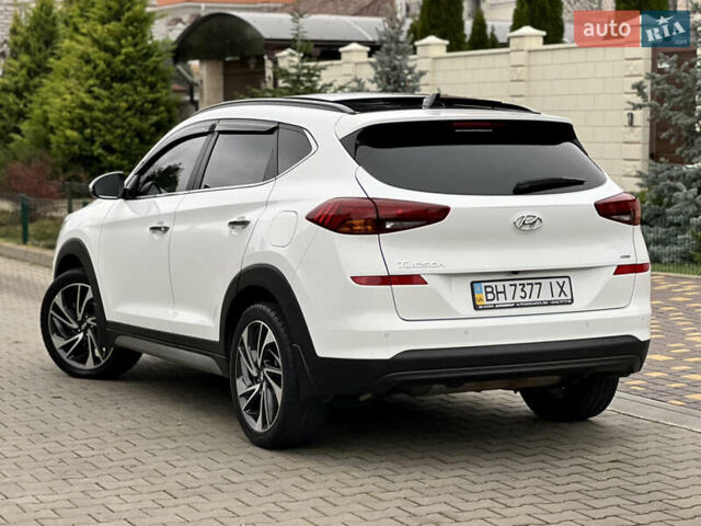 Белый Хендай Туксон, объемом двигателя 2 л и пробегом 50 тыс. км за 23800 $, фото 11 на Automoto.ua