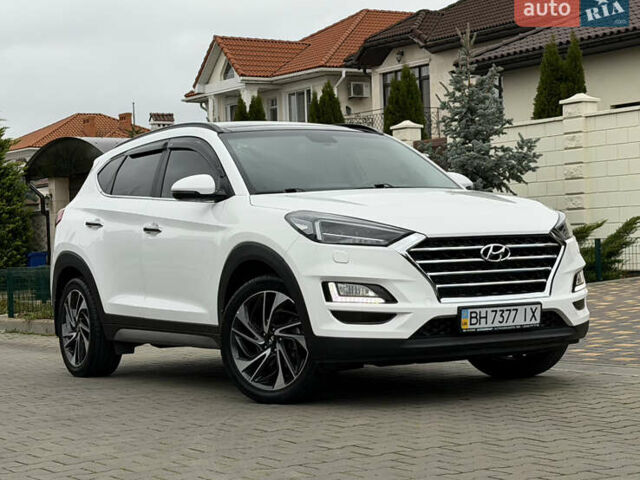 Белый Хендай Туксон, объемом двигателя 2 л и пробегом 50 тыс. км за 23800 $, фото 14 на Automoto.ua