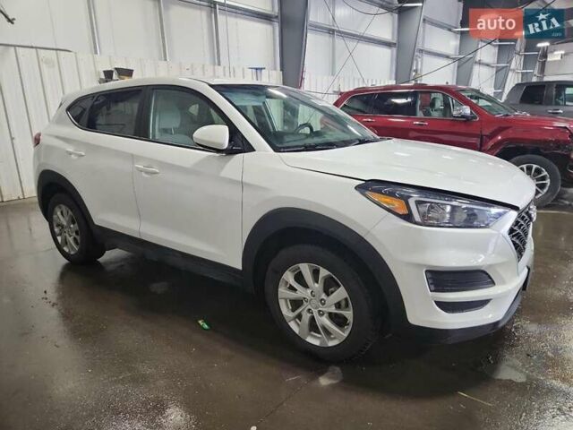 Белый Хендай Туксон, объемом двигателя 2 л и пробегом 85 тыс. км за 4300 $, фото 3 на Automoto.ua