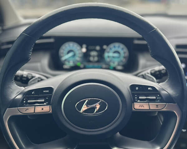 Білий Хендай Туксон, об'ємом двигуна 1.6 л та пробігом 95 тис. км за 31000 $, фото 4 на Automoto.ua