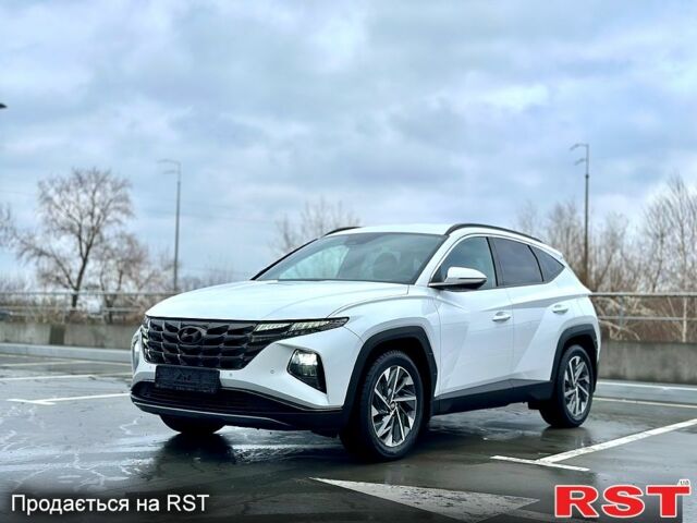 Белый Хендай Туксон, объемом двигателя 2 л и пробегом 67 тыс. км за 24500 $, фото 1 на Automoto.ua