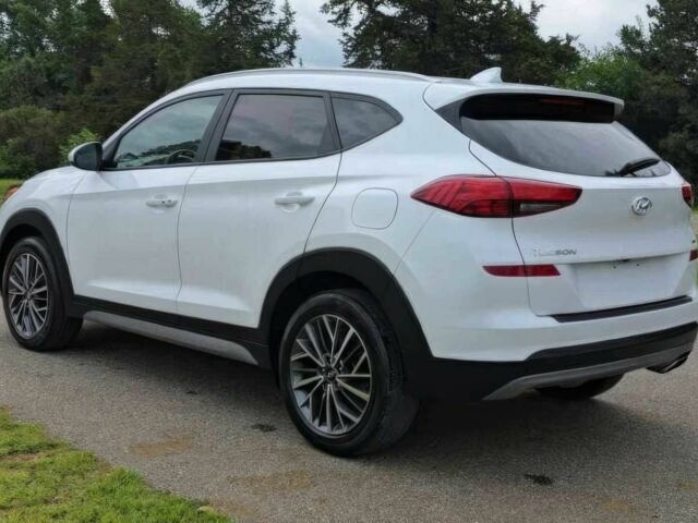 Белый Хендай Туксон, объемом двигателя 2.4 л и пробегом 26 тыс. км за 13000 $, фото 3 на Automoto.ua