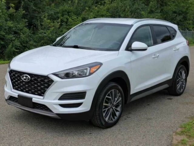 Белый Хендай Туксон, объемом двигателя 2.4 л и пробегом 26 тыс. км за 13000 $, фото 2 на Automoto.ua