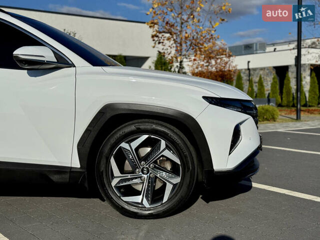 Белый Хендай Туксон, объемом двигателя 2 л и пробегом 147 тыс. км за 23700 $, фото 100 на Automoto.ua
