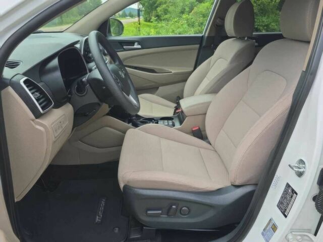 Белый Хендай Туксон, объемом двигателя 2.4 л и пробегом 26 тыс. км за 13000 $, фото 7 на Automoto.ua