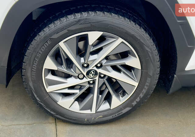 Білий Хендай Туксон, об'ємом двигуна 2 л та пробігом 67 тис. км за 24500 $, фото 70 на Automoto.ua