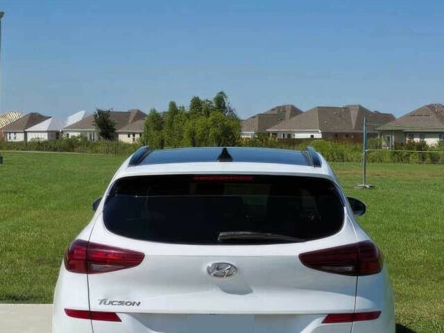 Белый Хендай Туксон, объемом двигателя 2.4 л и пробегом 21 тыс. км за 9800 $, фото 4 на Automoto.ua