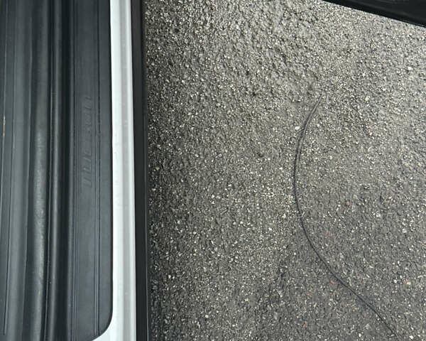 Белый Хендай Туксон, объемом двигателя 2 л и пробегом 89 тыс. км за 28100 $, фото 9 на Automoto.ua