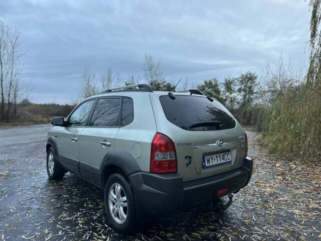 Бежевый Хендай Туксон, объемом двигателя 2 л и пробегом 247 тыс. км за 3500 $, фото 2 на Automoto.ua