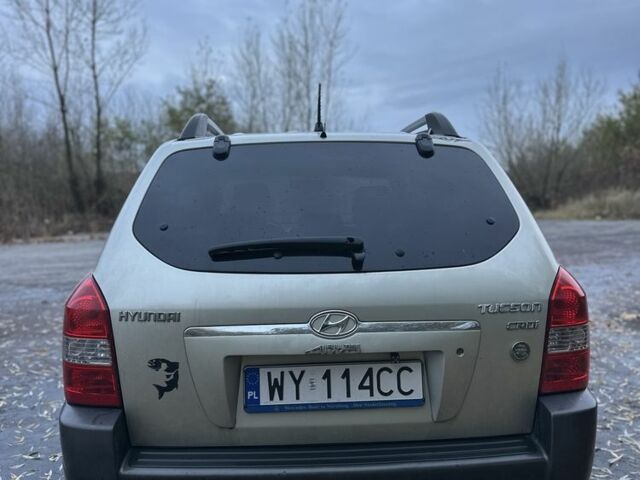 Бежевый Хендай Туксон, объемом двигателя 2 л и пробегом 247 тыс. км за 3500 $, фото 3 на Automoto.ua