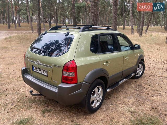 Бежевый Хендай Туксон, объемом двигателя 1.98 л и пробегом 325 тыс. км за 6500 $, фото 1 на Automoto.ua