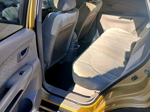 Бежевый Хендай Туксон, объемом двигателя 2 л и пробегом 250 тыс. км за 7500 $, фото 6 на Automoto.ua