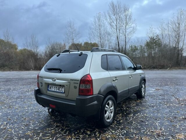Бежевый Хендай Туксон, объемом двигателя 2 л и пробегом 247 тыс. км за 3500 $, фото 4 на Automoto.ua