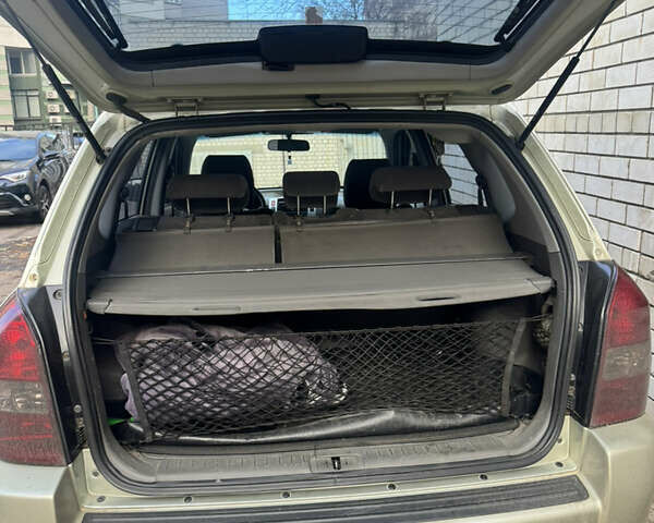 Бежевый Хендай Туксон, объемом двигателя 2 л и пробегом 325 тыс. км за 7400 $, фото 6 на Automoto.ua