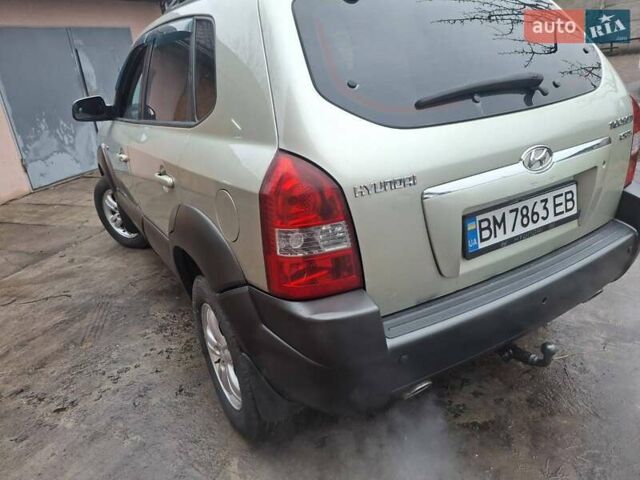 Бежевый Хендай Туксон, объемом двигателя 1.99 л и пробегом 180 тыс. км за 7700 $, фото 4 на Automoto.ua