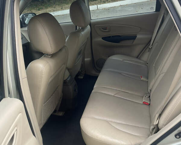 Бежевый Хендай Туксон, объемом двигателя 1.98 л и пробегом 415 тыс. км за 7800 $, фото 5 на Automoto.ua