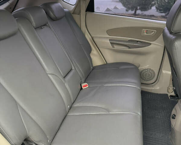 Бежевый Хендай Туксон, объемом двигателя 1.98 л и пробегом 248 тыс. км за 7500 $, фото 12 на Automoto.ua