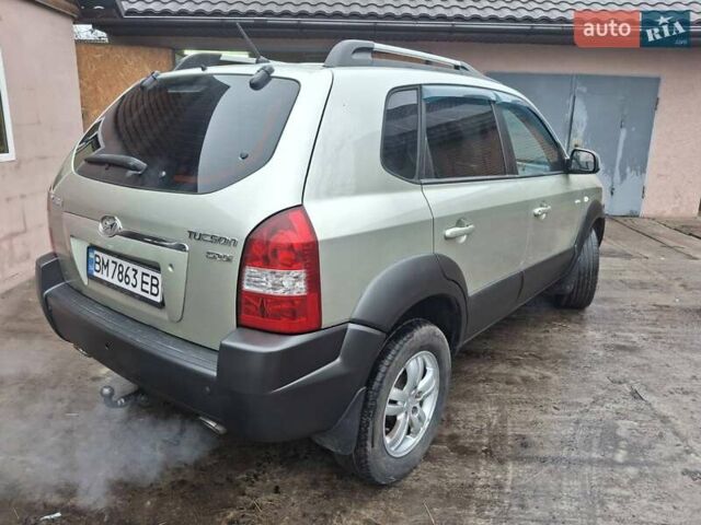 Бежевый Хендай Туксон, объемом двигателя 1.99 л и пробегом 180 тыс. км за 7700 $, фото 3 на Automoto.ua