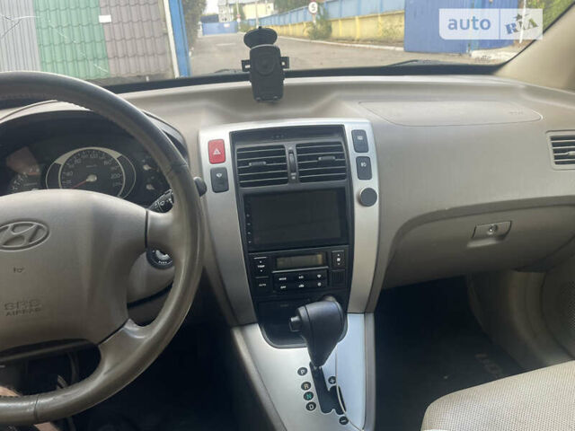Бежевый Хендай Туксон, объемом двигателя 1.98 л и пробегом 415 тыс. км за 7800 $, фото 11 на Automoto.ua