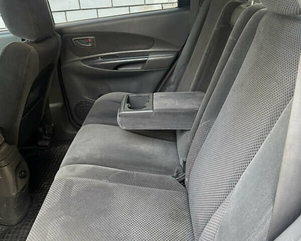 Бежевый Хендай Туксон, объемом двигателя 2 л и пробегом 325 тыс. км за 7400 $, фото 9 на Automoto.ua