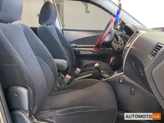 Бежевий Хендай Туксон, об'ємом двигуна 2 л та пробігом 270 тис. км за 7700 $, фото 8 на Automoto.ua
