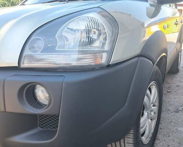 Бежевий Хендай Туксон, об'ємом двигуна 1.98 л та пробігом 202 тис. км за 7300 $, фото 7 на Automoto.ua