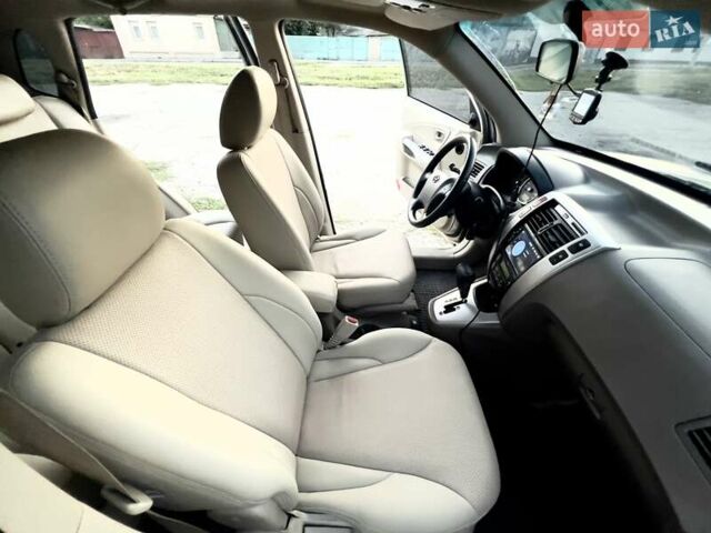 Бежевый Хендай Туксон, объемом двигателя 1.98 л и пробегом 158 тыс. км за 8500 $, фото 14 на Automoto.ua