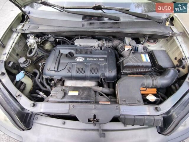 Бежевый Хендай Туксон, объемом двигателя 1.98 л и пробегом 264 тыс. км за 7500 $, фото 15 на Automoto.ua