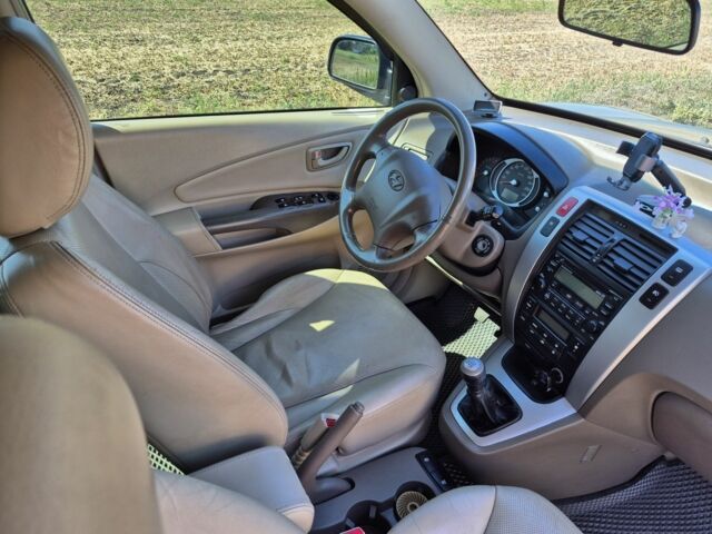 Бежевый Хендай Туксон, объемом двигателя 2 л и пробегом 180 тыс. км за 8300 $, фото 18 на Automoto.ua