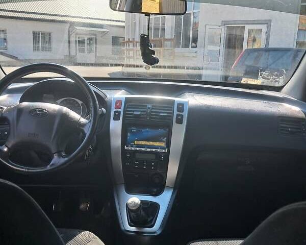 Бежевий Хендай Туксон, об'ємом двигуна 1.98 л та пробігом 202 тис. км за 7300 $, фото 15 на Automoto.ua