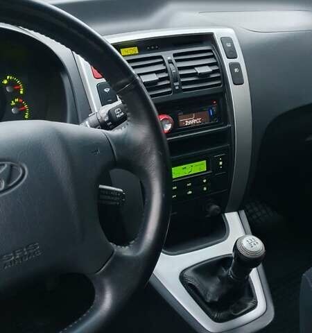 Бежевый Хендай Туксон, объемом двигателя 2 л и пробегом 254 тыс. км за 7700 $, фото 44 на Automoto.ua