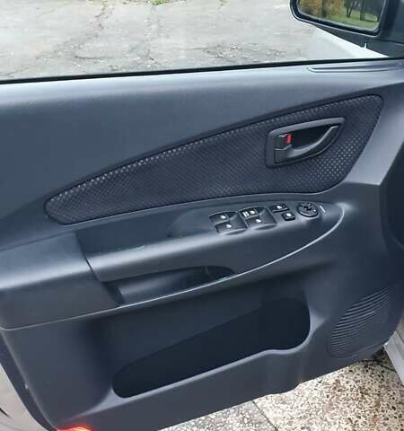 Бежевый Хендай Туксон, объемом двигателя 2 л и пробегом 254 тыс. км за 7700 $, фото 31 на Automoto.ua