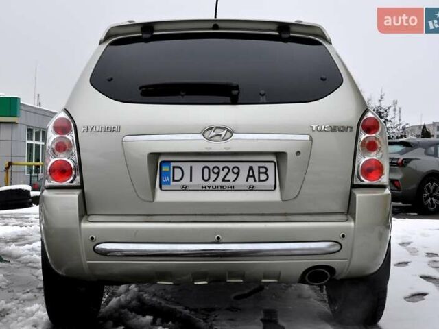 Бежевый Хендай Туксон, объемом двигателя 1.98 л и пробегом 257 тыс. км за 6500 $, фото 10 на Automoto.ua