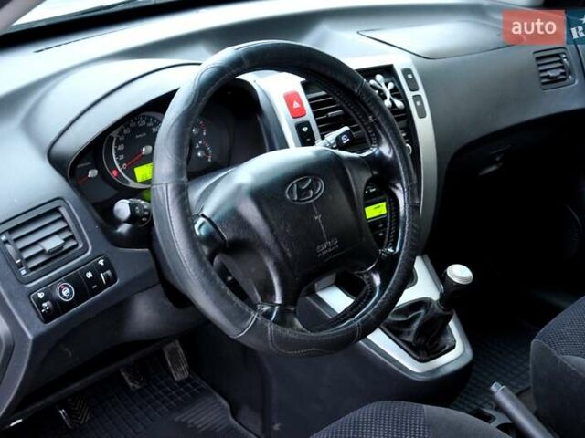 Бежевый Хендай Туксон, объемом двигателя 1.98 л и пробегом 257 тыс. км за 6500 $, фото 15 на Automoto.ua