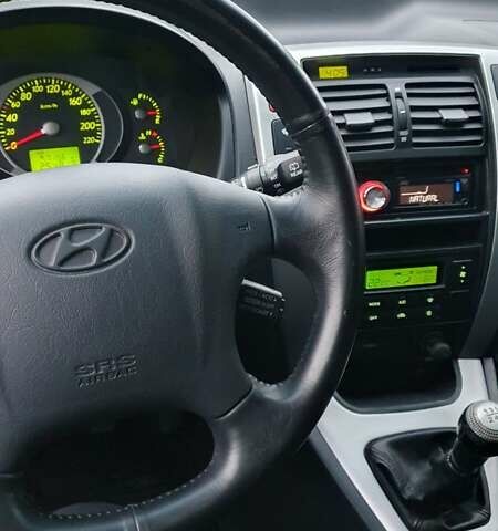 Бежевый Хендай Туксон, объемом двигателя 2 л и пробегом 254 тыс. км за 7700 $, фото 43 на Automoto.ua